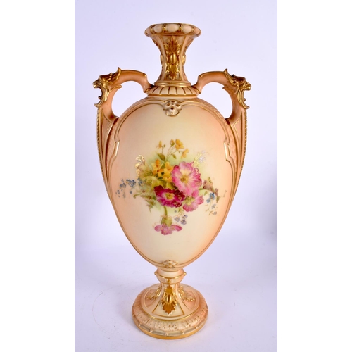 177 - Royal Worcester two handled blush ivory vase, shape 2330, painted with flowers on a scale moulded bo... 