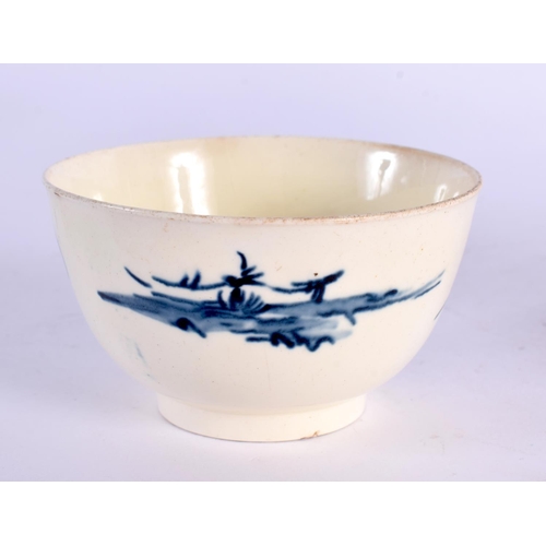 183 - 18th century good creamware teabowl and saucer painted in under glaze blue with a Chinese landscape.... 