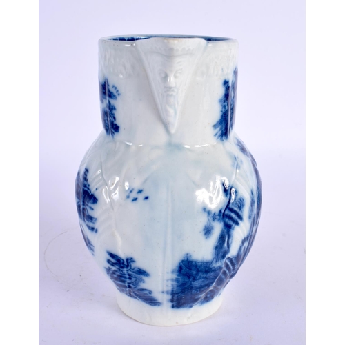 190 - 18th century Caughley mask jug printed in under glaze blue with chinoiserie scenes. 15cm High