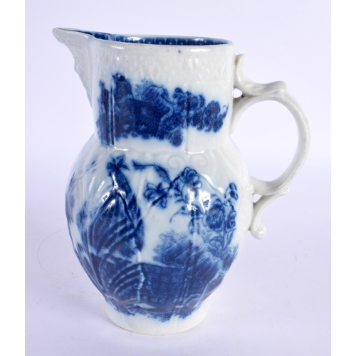 190 - 18th century Caughley mask jug printed in under glaze blue with chinoiserie scenes. 15cm High