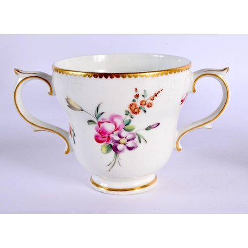 194 - 18th century Chelsea Derby two handled chocolate cup and stand painted with flowers in the style of ... 