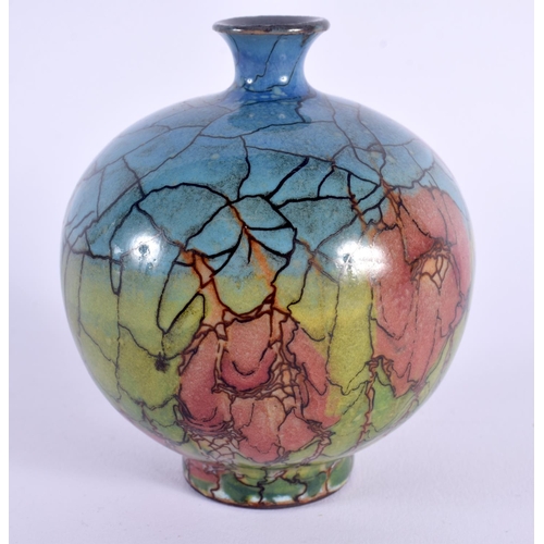 22 - A SMALL STYLISH ENGLISH POTTERY ART NOUVEAU TYPE BULBOUS VASE painted with motifs upon a cracked ice... 