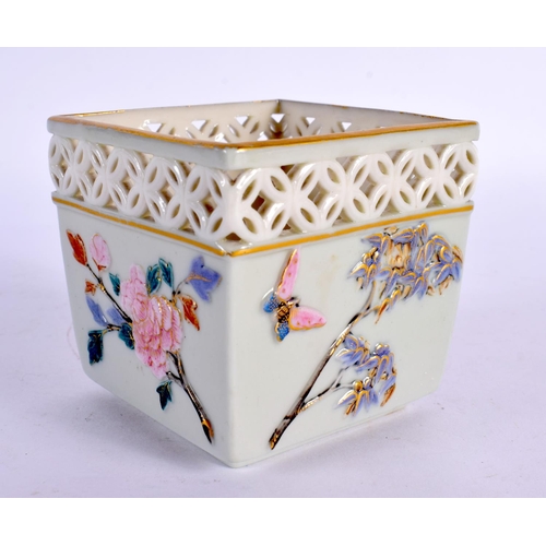 226 - Royal Worcester reticulated pot in Japanese taste moulded and painted with prunus blossoms and butte... 