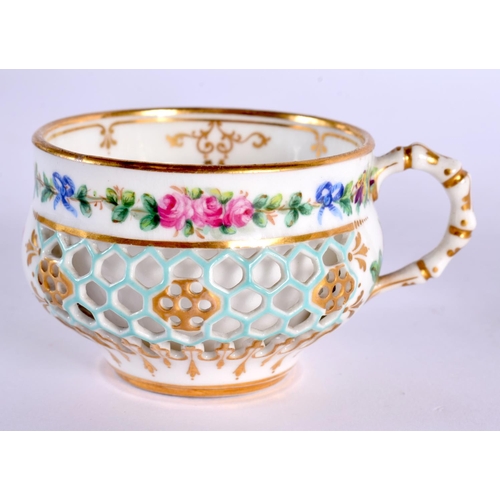 227 - Royal Worcester teacup and a saucer reticulated in the manner of George Owen both painted with birds... 