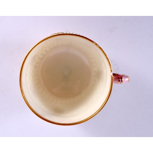 228 - Royal Worcester teacup reticulated in the manner of George Owen, the border with blue and white jewe... 