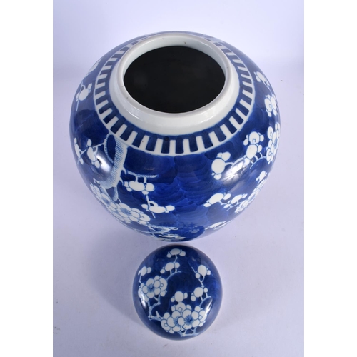 255 - A LARGE 19TH CENTURY CHINESE BLUE AND WHITE PORCELAIN GINGER JAR AND COVER Kangxi style. 31 cm x 18 ... 