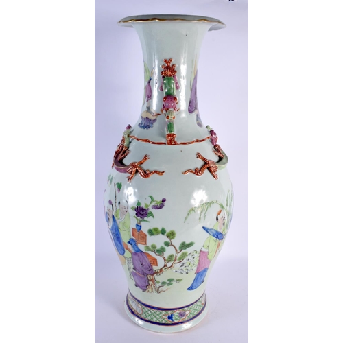 256 - A LARGE 19TH CENTURY CHINESE FAMILLE ROSE BALUSTER PORCELAIN VASE Qing, painted with figures and ove... 