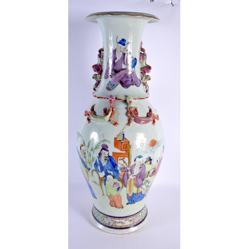 256 - A LARGE 19TH CENTURY CHINESE FAMILLE ROSE BALUSTER PORCELAIN VASE Qing, painted with figures and ove... 