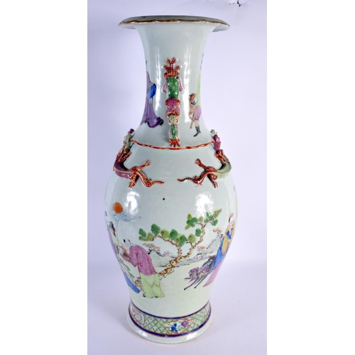 256 - A LARGE 19TH CENTURY CHINESE FAMILLE ROSE BALUSTER PORCELAIN VASE Qing, painted with figures and ove... 