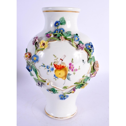 259 - A LARGE MEISSEN FLORAL ENCRUSTED PORCELAIN VASE painted with putti and overlaid with vines. 22 cm x ... 