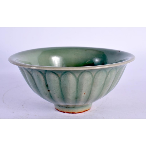 261 - AN EARLY CHINESE CELADON SCALLOPED TEABOWL probably Sung. 10.5 cm diameter.