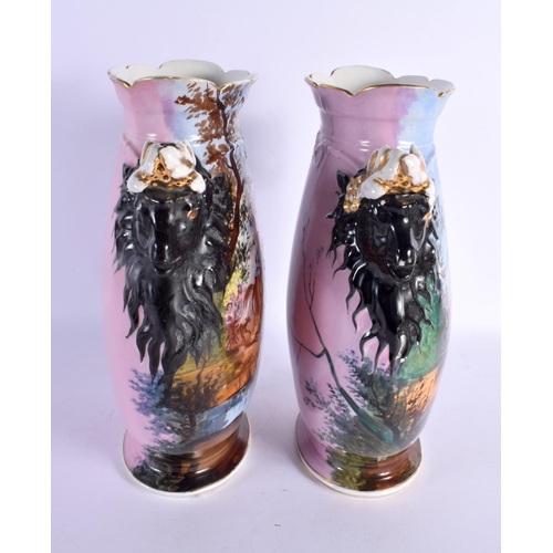 267 - A PAIR OF 19TH CENTURY FRENCH PARIS PORCELAIN VASES painted with figures in landscapes. 34 cm x 19 c... 