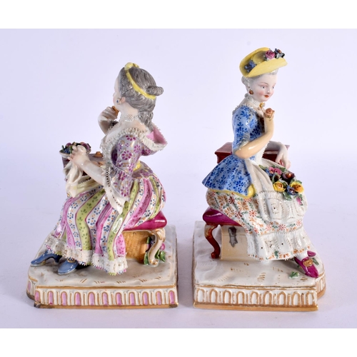 268 - A PAIR OF 19TH CENTURY GERMAN MEISSEN PORCELAIN FIGURAL GROUPS modelled beside a table. 14 cm x 11 c... 