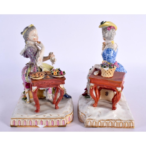 268 - A PAIR OF 19TH CENTURY GERMAN MEISSEN PORCELAIN FIGURAL GROUPS modelled beside a table. 14 cm x 11 c... 