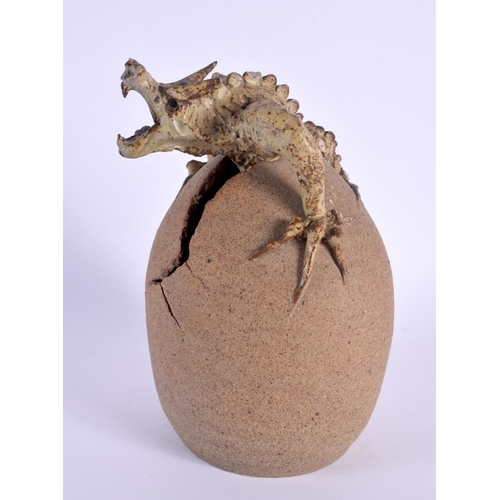 27 - A CHARMING BLADON POTTERY GROTESQUE HATCHING DRAGON EGG SCULPTURE. 20 cm high.