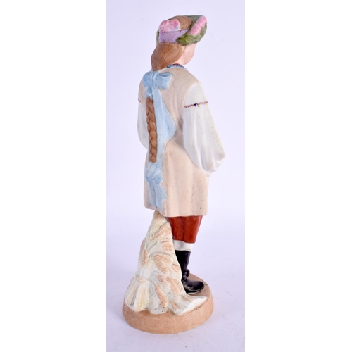 277 - A RUSSIAN PORCELAIN FIGURE OF A STANDING FEMALE modelled wearing a floral wreath. 22 cm high.