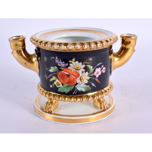 281 - AN EARLY 19TH CENTURY FRENCH EMPIRE PORCELAIN INKWELL painted with flowers. 12 cm wide.