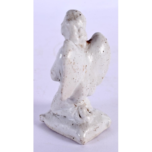 282 - AN 18TH/19TH CENTURY EUROPEAN PORCELAIN FIGURE OF A WINGED BOY. 7.5 cm x 3 cm.