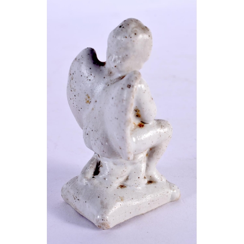 282 - AN 18TH/19TH CENTURY EUROPEAN PORCELAIN FIGURE OF A WINGED BOY. 7.5 cm x 3 cm.