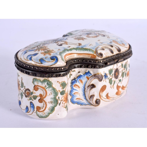 283 - AN 18TH/19TH CENTURY FRENCH FAIENCE TIN GLAZED BOX painted with figures dancing. 9 cm x 6.5 cm.