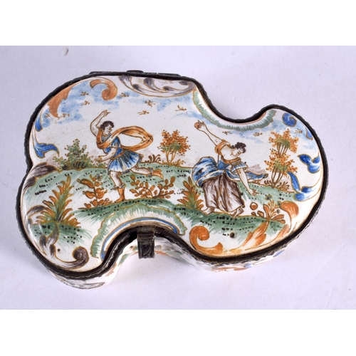 283 - AN 18TH/19TH CENTURY FRENCH FAIENCE TIN GLAZED BOX painted with figures dancing. 9 cm x 6.5 cm.