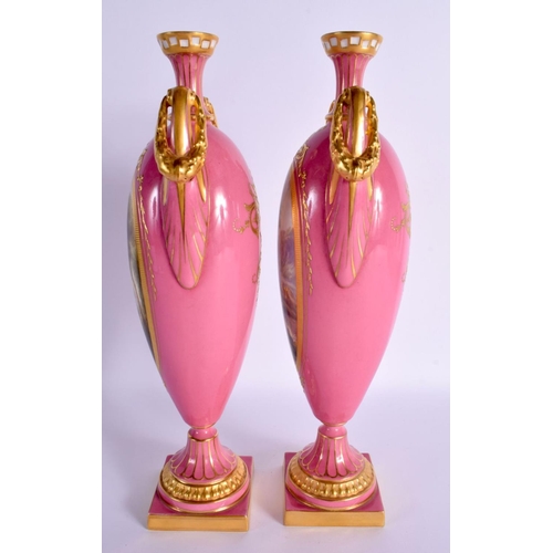 29 - A FINE PAIR OF 19TH CENTURY ROYAL WORCESTER TWIN HANDLED PINK GROUND VASES by Harry Davis, painted w... 