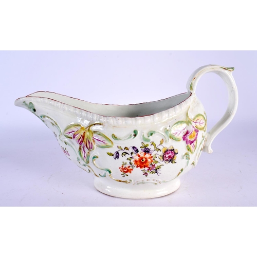 290D - A LARGE 18TH CENTURY DERBY PORCELAIN SAUCEBOAT painted with floral sprays. 22 cm x 12 cm.