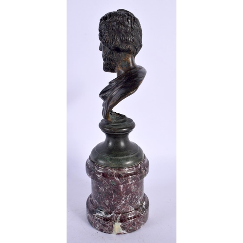 291B - A 19TH CENTURY EUROPEAN GRAND TOUR BRONZE BUST OF AN EMPEROR modelled upon a marble base. 24 cm high... 