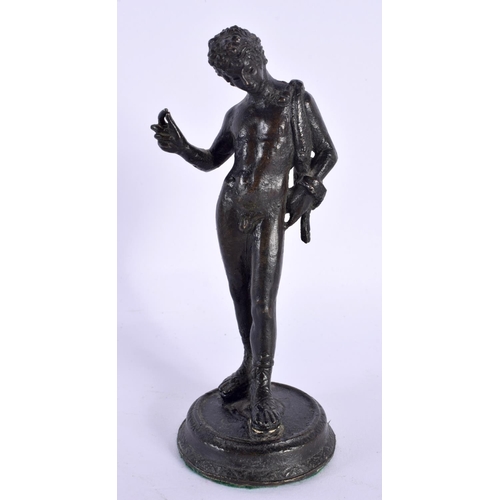 291D - A 19TH CENTURY EUROPEAN GRAND TOUR FIGURE OF A MALE modelled upon a circular base. 14 cm high.