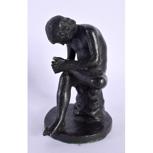 291E - A 19TH CENTURY EUROPEAN BRONZE FIGURE OF THE THORN PICKER modelled upon a circular base. 11 cm high.