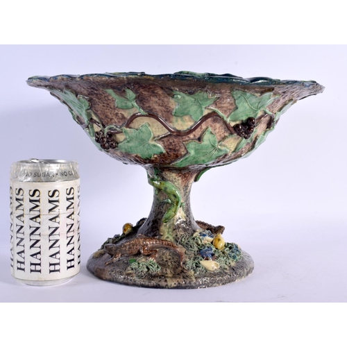 294E - A LARGE 19TH CENTURY PORTUGUESE MAJOLICA PEDESTAL COMPORT Attributed to Palissy, decorated all over ... 