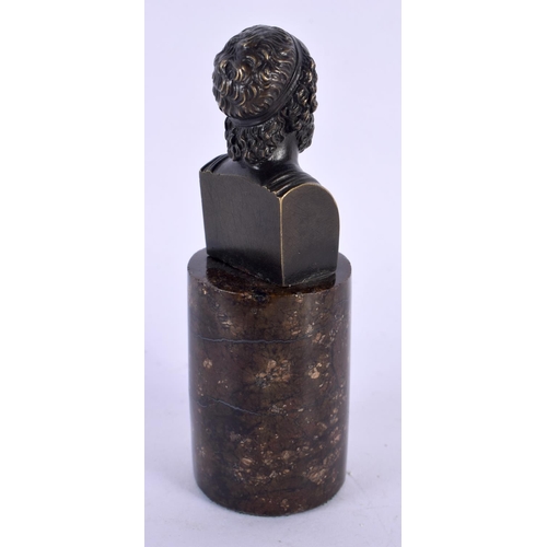 296D - A 19TH CENTURY EUROPEAN GRAND TOUR BRONZE BUST OF HOMER upon a porphyry type base. 11 cm high.