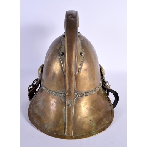 296E - AN ANTIQUE FIREMANS HELMET. 24 cm x 20 cm.