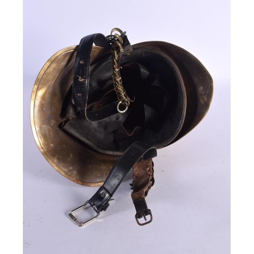 296E - AN ANTIQUE FIREMANS HELMET. 24 cm x 20 cm.