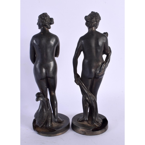 296 - A PAIR OF 19TH CENTURY EUROPEAN BRONZE GRAND TOUR FIGURES OF FEMALES modelled upon circular bases. 1... 