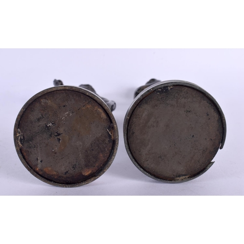 296 - A PAIR OF 19TH CENTURY EUROPEAN BRONZE GRAND TOUR FIGURES OF FEMALES modelled upon circular bases. 1... 