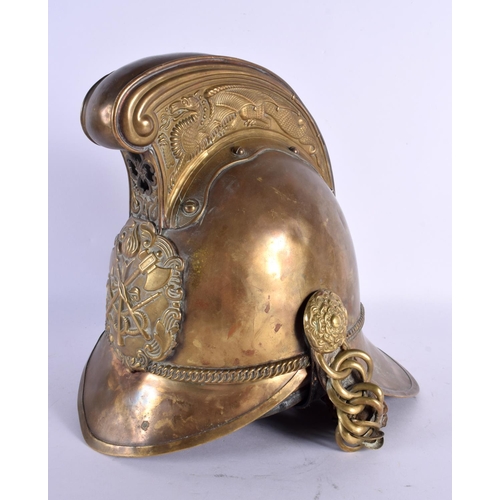 296E - AN ANTIQUE FIREMANS HELMET. 24 cm x 20 cm.