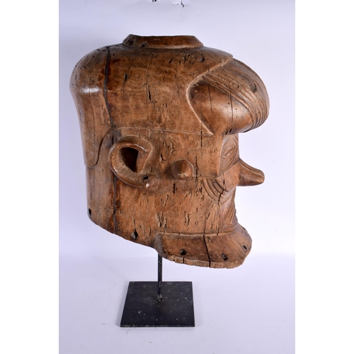 297C - A LARGE EARLY 20TH CENTURY AFRICAN CARVED WOOD TRIBAL MASK with incised features. 40 cm x 24 cm.