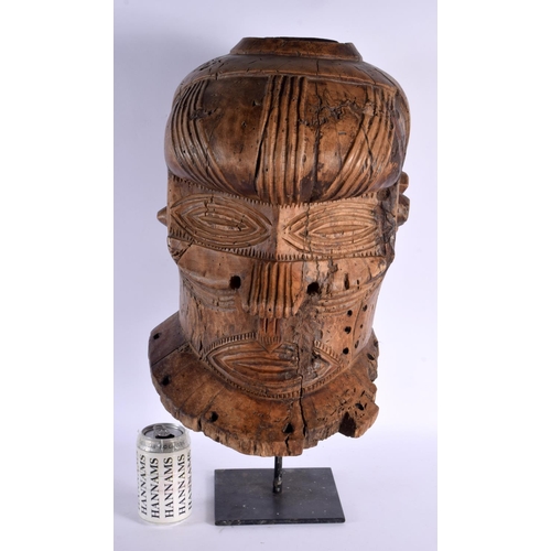 297C - A LARGE EARLY 20TH CENTURY AFRICAN CARVED WOOD TRIBAL MASK with incised features. 40 cm x 24 cm.