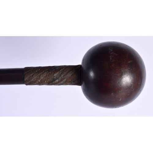 298B - A GOOD ANTIQUE TRIBAL CARVED KNOBKERRIE THROWING HARDWOOD CLUB. 63 cm long.