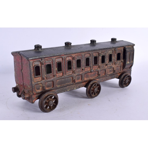 299B - AN ANTIQUE WALLWORKS PATENT CAST IRON TRAIN CARRIAGE. 22 cm wide.