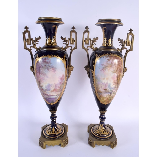 304 - A LARGE PAIR OF LATE 19TH CENTURY FRENCH SEVRES STYLE TWIN HANDLED PORCELAIN VASES probably Paris. 4... 