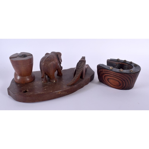 307 - AN EARLY 20TH CENTURY SRI LANKAN CEYLON HARDWOOD DESK STAND together with a horse shoe ashtray. Larg... 