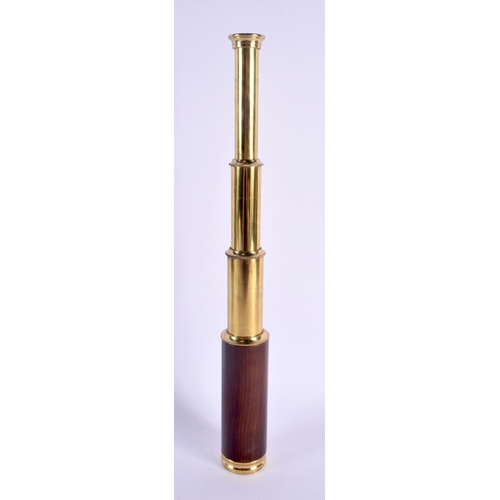 321 - A THREE DRAWER BRASS TELESCOPE. 37 cm long extended.