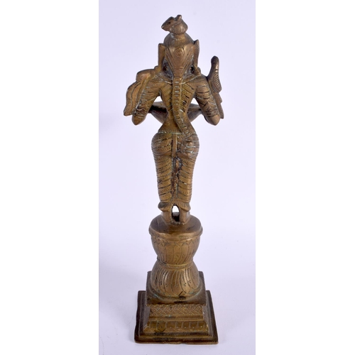 326 - A LARGE 19TH CENTURY INDIAN BRONZE FIGURE OF A BUDDHISTIC DEITY modelled holding an oil burner. 29 c... 