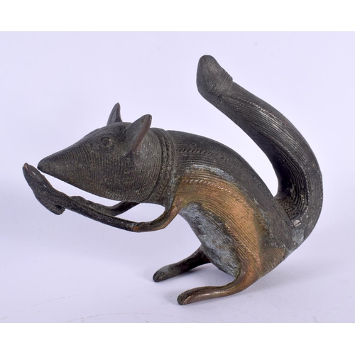 329 - A RARE 19TH CENTURY AFRICAN BENIN BRONZE FIGURE OF A BUSHY TAILED SQUIRREL modelled clutching a nut.... 