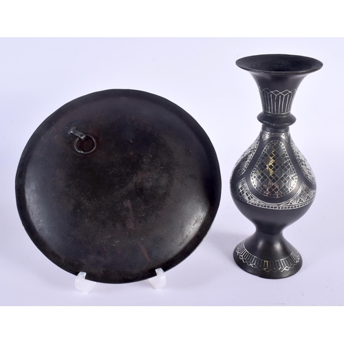 330 - A 19TH CENTURY MIDDLE EASTERN SILVER INLAID BRONZE VASE together with a similar silver inlaid dish. ... 