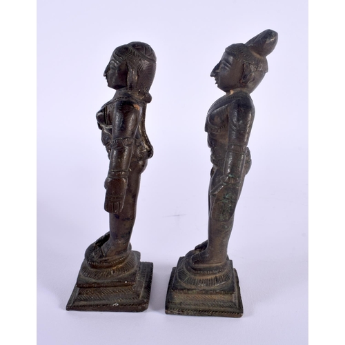 332 - A PAIR OF 19TH CENTURY INDIAN BRONZE FIGURES OF STANDING DEITIES modelled with arms by their sides. ... 