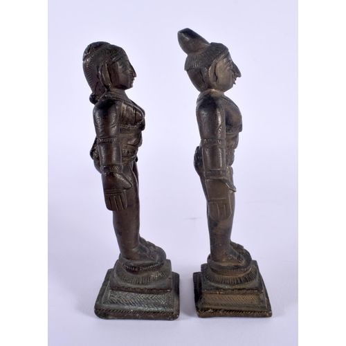 332 - A PAIR OF 19TH CENTURY INDIAN BRONZE FIGURES OF STANDING DEITIES modelled with arms by their sides. ... 