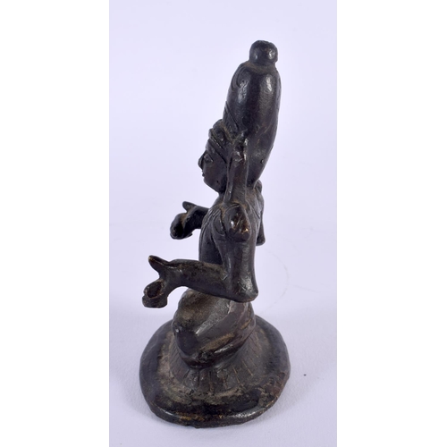 333 - AN 18TH CENTURY INDIAN BRONZE FIGURE OF A SEATED DEITY modelled with both hands outstretched. 11 cm ... 